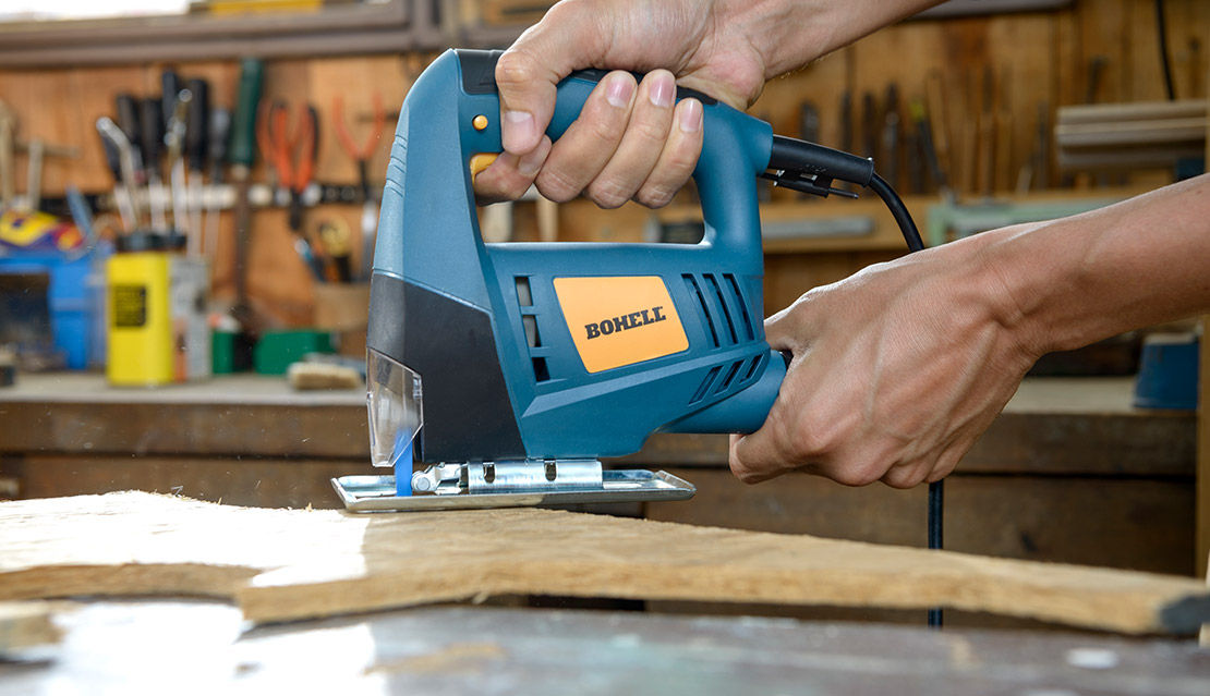 Rubber handle and coupling for vacuum cleaner